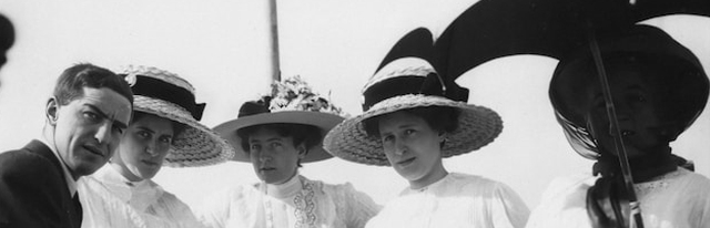 Group of women wearing elaborate hats, circa 1900 — historical reference image for actors preparing for period roles