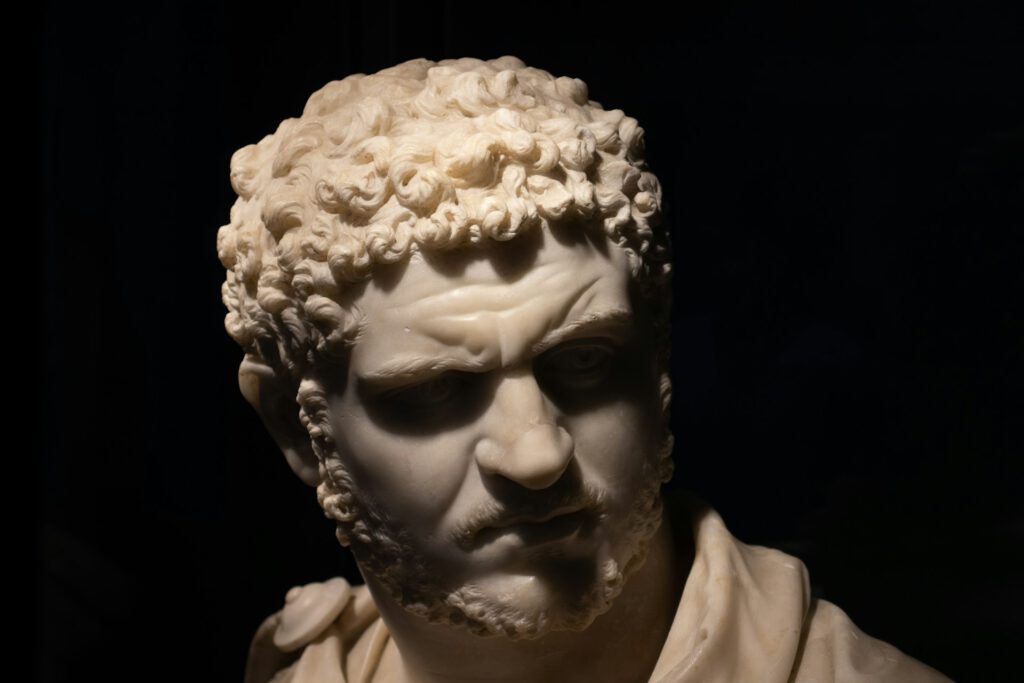 Statue of Roman Emperor Caracalla — symbol of history’s weight and complexity. This image introduces research for actors who play real people, showing how archival fragments and emotional evidence help performers embody characters with truth.